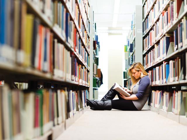 Kean University student in Library