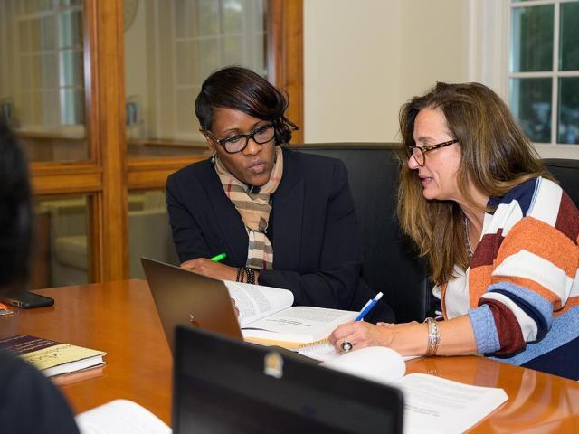 Financial aid officer working with a student